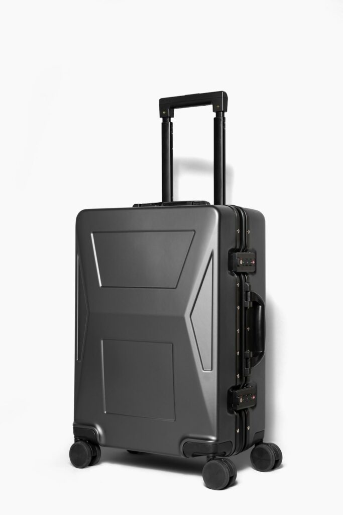 a piece of luggage with wheels on a white background